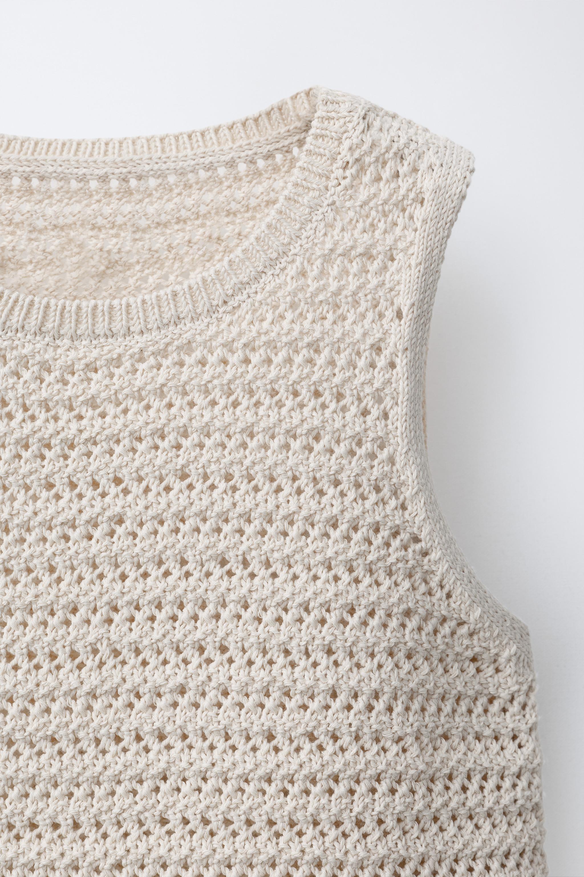 TOP EN MAILLE À FRANGES